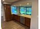 Modern kitchen with granite countertops, stainless steel appliances, and ample cabinet space at 1894 Union St, Clearwater, FL 33763