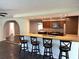 Stylish kitchen with a breakfast bar, granite countertops, and stainless steel appliances at 1894 Union St, Clearwater, FL 33763