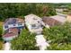 Bird's eye view showing the house with a driveway, landscaping, and neighboring homes at 20123 Bay Cedar Ave, Tampa, FL 33647