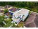 Aerial shot of home showcasing the property's roof, landscaping, and surrounding neighborhood at 20123 Bay Cedar Ave, Tampa, FL 33647