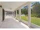 Screened in porch, with plenty of space and an unobstructed view of the backyard at 20123 Bay Cedar Ave, Tampa, FL 33647