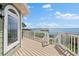 Waterfront deck with steps, showing the proximity to the water and offering scenic views from the home at 2081 Pointe Alexis Dr, Tarpon Springs, FL 34689