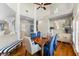Dining room with hardwood floors, neutral walls, and tasteful décor including elegant furnishings and a stylish buffet at 2081 Pointe Alexis Dr, Tarpon Springs, FL 34689