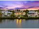 Charming waterfront house with a private dock, beautifully landscaped yard, and stunning water views at 2081 Pointe Alexis Dr, Tarpon Springs, FL 34689