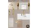 Guest bathroom featuring gold fixtures, a large mirror, and sleek hardware at 211 29Th Ave N, St Petersburg, FL 33704