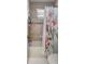 Bathroom featuring combination tub/shower with floral curtain at 27318 Sora Blvd, Wesley Chapel, FL 33544