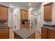 Well-appointed kitchen with central island and ample storage at 27318 Sora Blvd, Wesley Chapel, FL 33544