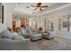 Expansive living room with open kitchen, perfect for modern living at 27318 Sora Blvd, Wesley Chapel, FL 33544