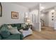 Inviting living room with a view to the entry hall and stairs at 27318 Sora Blvd, Wesley Chapel, FL 33544