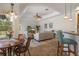 Open living space combines dining and living areas in an airy design at 27318 Sora Blvd, Wesley Chapel, FL 33544