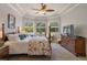 Bright and airy main bedroom with tray ceilings and bay windows at 27318 Sora Blvd, Wesley Chapel, FL 33544