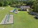 Aerial view of community playground featuring a covered picnic area, swings, and a slide at 27318 Sora Blvd, Wesley Chapel, FL 33544