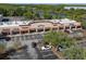 Retail shops in a small strip mall, offering retail and service businesses with visible storefronts and accessible parking spots at 27318 Sora Blvd, Wesley Chapel, FL 33544