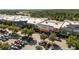 Aerial view of a large shopping center featuring stores such as Best Buy and Ulta with ample parking at 27318 Sora Blvd, Wesley Chapel, FL 33544