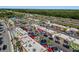 Retail shops in open-air shopping center with dining options and street-side vendors, surrounded by accessible parking at 27318 Sora Blvd, Wesley Chapel, FL 33544