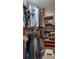 Well-organized walk-in closet featuring custom shelving and hanging racks at 27318 Sora Blvd, Wesley Chapel, FL 33544