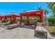 Relaxing pool-side cabanas with comfortable seating, providing shade and a luxurious experience at 2746 Via Tivoli # 135A, Clearwater, FL 33764