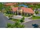 Elegant clubhouse featuring lush landscaping, perfect for community gatherings and events at 2746 Via Tivoli # 135A, Clearwater, FL 33764
