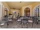 Outdoor patio offering ample seating, ceiling fan, beautiful views, and an outdoor television at 2746 Via Tivoli # 135A, Clearwater, FL 33764