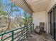 Balcony view with a lounge chair and green trees and outdoor landscape at 320 Island Way # 606, Clearwater Beach, FL 33767