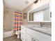 Bright bathroom with updated vanity, tub, and modern fixtures at 320 Island Way # 606, Clearwater Beach, FL 33767