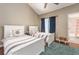 Bedroom features two beds, hardwood floors, ensuite bath and ceiling fan at 320 Island Way # 606, Clearwater Beach, FL 33767