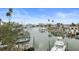 Wide view of homes along the harbor with boat docks and boat slips at 326 129Th E Ave, Madeira Beach, FL 33708