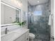 Tastefully designed bathroom with a shower and vanity, boasting white trim and cabinets at 326 129Th E Ave, Madeira Beach, FL 33708