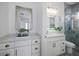 Modern bathroom layout with vanity, shower, and attractive marble styled wall and floor tile at 326 129Th E Ave, Madeira Beach, FL 33708