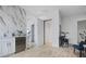 Hallway leading to multiple rooms including a wet bar and sitting area at 326 129Th E Ave, Madeira Beach, FL 33708