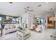 Spacious and bright open-concept living room and kitchen area with modern decor and flooring at 326 129Th E Ave, Madeira Beach, FL 33708