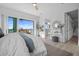 Bright main bedroom with balcony access, vanity, and walk-in closet at 326 129Th E Ave, Madeira Beach, FL 33708