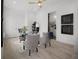 Bright office space with neutral walls, a modern ceiling fan, and a calming atmosphere for productivity at 326 129Th E Ave, Madeira Beach, FL 33708