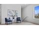 Cozy sitting area with stylish chairs, elegant decor, and natural light at 326 129Th E Ave, Madeira Beach, FL 33708