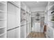 Spacious walk-in closet with custom shelving and storage solutions at 326 129Th E Ave, Madeira Beach, FL 33708