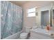 Bright bathroom with a tub and vanity at 4101 W Nassau St, Tampa, FL 33607