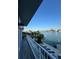 Balcony with water views and lounge chairs from waterfront property at 460 137Th Avenue Cir, Madeira Beach, FL 33708