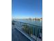 Waterfront balcony with stunning panoramic views of the bay and surrounding cityscape, a perfect outdoor escape at 460 137Th Avenue Cir, Madeira Beach, FL 33708