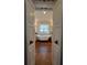 Bathroom with a claw foot tub, double sinks and chandelier at 460 137Th Avenue Cir, Madeira Beach, FL 33708