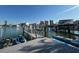 Home dock with boat lift and jet skis at 460 137Th Avenue Cir, Madeira Beach, FL 33708