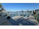 Spacious dock equipped with boat lifts and jet skis, offering direct water access with scenic views at 460 137Th Avenue Cir, Madeira Beach, FL 33708