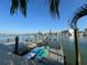 Home dock with jet ski lifts and water access at 460 137Th Avenue Cir, Madeira Beach, FL 33708
