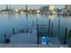 Dock area equipped with watercraft lifts and kayak storage, perfect for waterfront living at 460 137Th Avenue Cir, Madeira Beach, FL 33708