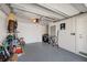 A spacious garage with epoxy floors, offering ample storage and functional workspace at 460 137Th Avenue Cir, Madeira Beach, FL 33708
