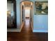 Hallway leads to main bathroom with a claw foot tub at 460 137Th Avenue Cir, Madeira Beach, FL 33708