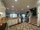 Open-concept kitchen with granite countertops, stainless steel appliances, and seamless flow to the living area at 460 137Th Avenue Cir, Madeira Beach, FL 33708