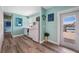 Cozy kitchenette with white cabinets, wood counters, and waterfront access for convenient entertaining at 460 137Th Avenue Cir, Madeira Beach, FL 33708