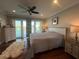 Beautiful primary bedroom with hardwood floors and water views at 460 137Th Avenue Cir, Madeira Beach, FL 33708