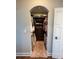 Walk-in closet with custom built-in shelves and drawers at 460 137Th Avenue Cir, Madeira Beach, FL 33708