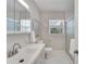 Bathroom vanity with a sink, mirror, and shower with glass doors at 4753 48Th N Ave, St Petersburg, FL 33714